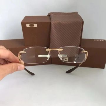 Óculos Oakley gold armação resistente e confortável