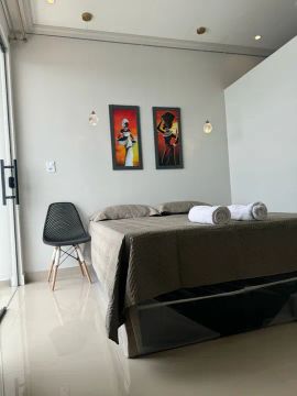 Flat aconchegante com varanda e ar condicionado, sem conta de energia