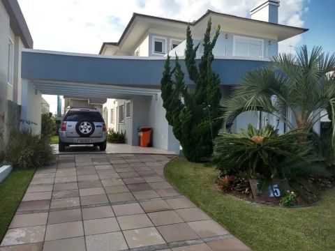 Casa mobiliada com 04 dormitórios à venda - Condomínio Atlântico Villas Club - Osório/RS R