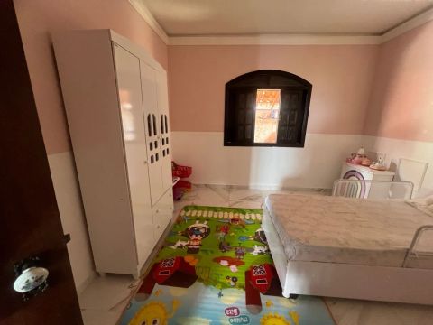 Terreno com casa com sacada 