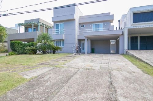 Venda de Casa em Condomínio em Porto Alegre-RS, bairro Terra Ville com 455m² Área Const. e