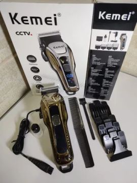 Vendo máquina profissional Kemei turbo 