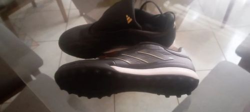 Chuteira futebol society