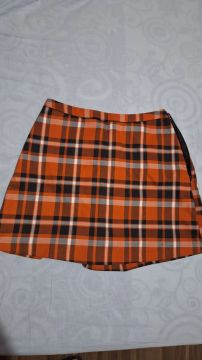 Short saia xadrez laranja e preta