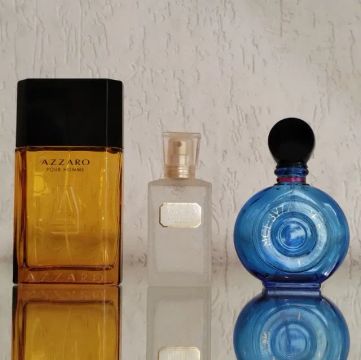 Frascos de perfume Dior Rochas Azzaro 