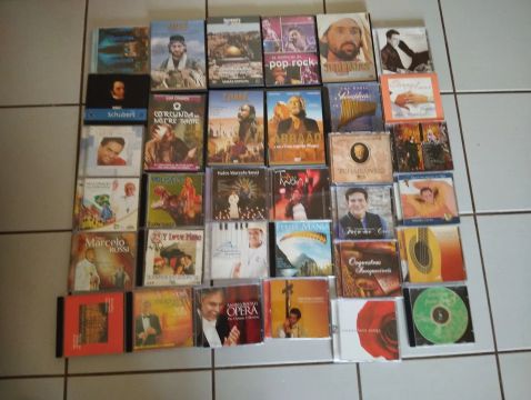Lote de CDs 45 e 7dvd 45 estojos