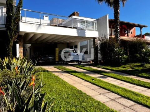 Casa em condomínio 5 dormitórios no Terra Ville bairro Belém Novo em Porto Alegre