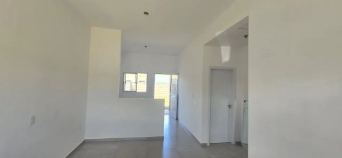 Alugo Casa NOVA 2/4 sendo 1 suite de Esquina terreno maior Condomínio Origem do Sol em Vár