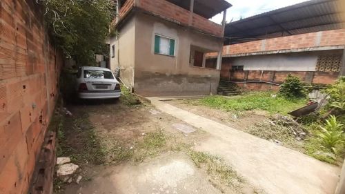 Terreno com casa em ótima localização