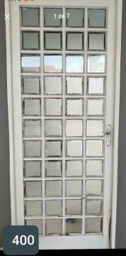 Porta de Vidro sasazaki. com chave é batente 2,10x80 