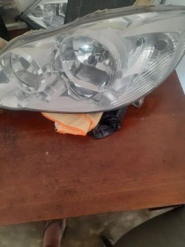 Farol Toyota corola 