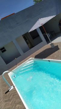 Casa com piscina nos olhos dagua 