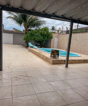 Casa de Temporada com piscina emPraia Grande