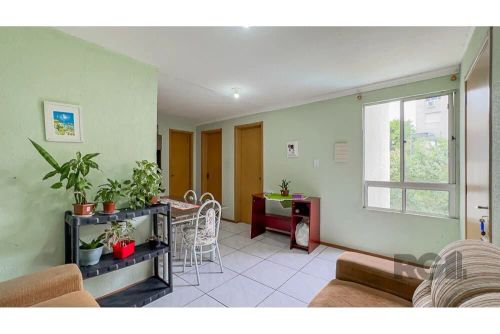 Descubra o seu novo lar no bairro Partenon. Este apartamento residencial à venda apresenta