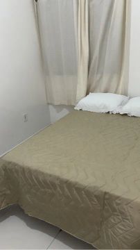 Casa com dois quartos banh. social e suite, garagem portão eletrônico