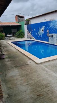 Linda casa com piscina,deck, 4 quartos. Disponível pata o Carnaval. 