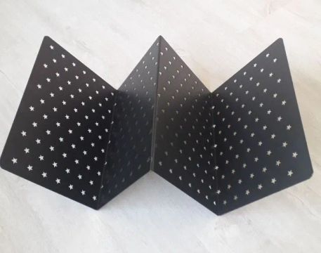 Revisteiro de metal estrelinhas