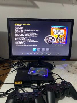 Playstation 2 com jogos e acessórios