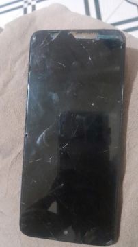 Celular com a tela queimada e  quebrado 