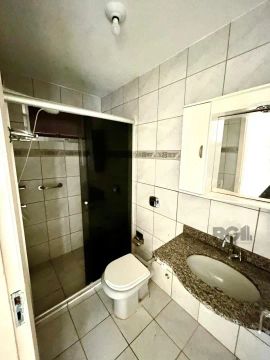 Excelente apartamento térreo, 2 dormitórios, living 2 ambientes, cozinha, área de serviço 