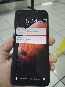 Celular Xiaomi Redmi 9 tela trincada