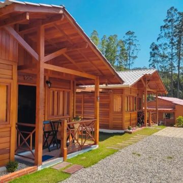 Chacara terra arenosa , chalés aconchegantes nas montanhas
