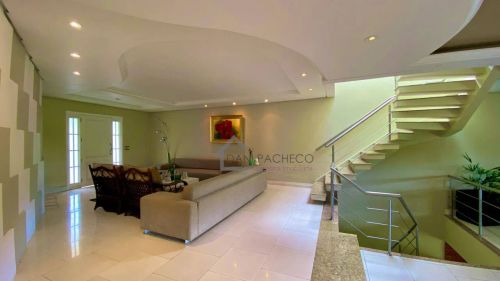 Casa com 5 dormitórios à venda, 720 m² por R$ 3.200.000,00 - Condomínio Condado de Castell