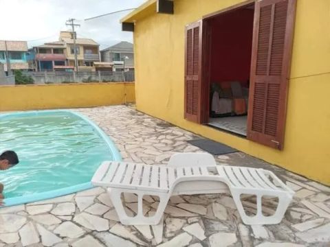 Casa na beira da praia ?