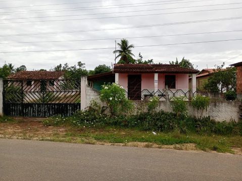 Terreno com casa em ótima localização