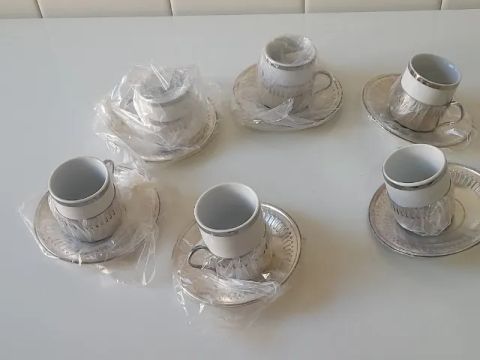 jogo de 6 xícaras porcelana suporte e pires aço inox pozzani antigo