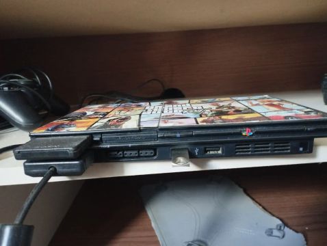 Playstation 2 com capa personalizada