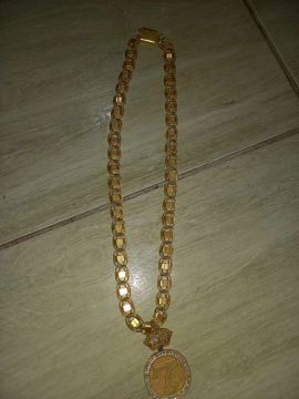 Corrente de moeda antiga e pingente do 7