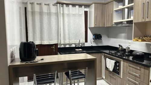 Quarto em sobrado compartilhado