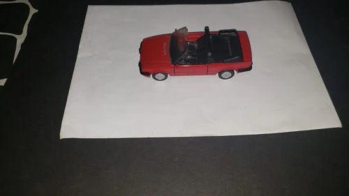 Miniatura carro excort xr3 conversivel na cor vermelha 