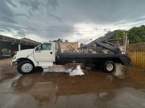 Caminhão Ford F12000 Poliguindaste duplo