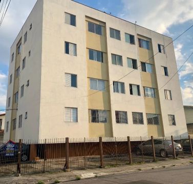 Apartamento com 1 dormitório para alugar, 65 m² por R$ 1.255,00/mês - Vila Galvão - Guarul