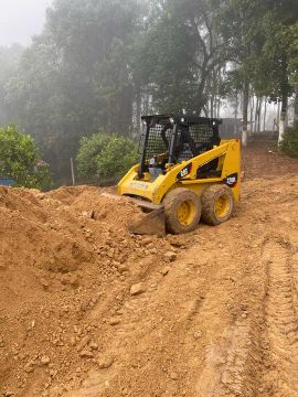 Retroescavadeira Bobcat 