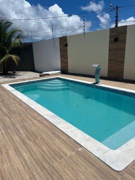 Casa com piscina no Lot Bosque de Arembepe