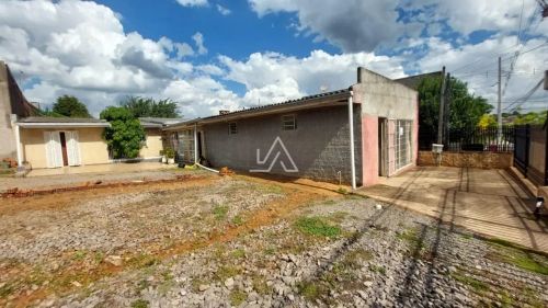 TRRRENO COM CASA DOIS DORMITÓRIOS