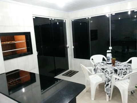 Excelente casa e apartamentos em Torres com ar condicionado