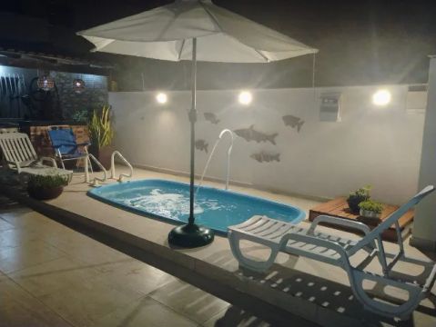 Casa de piscina temporada Guriri