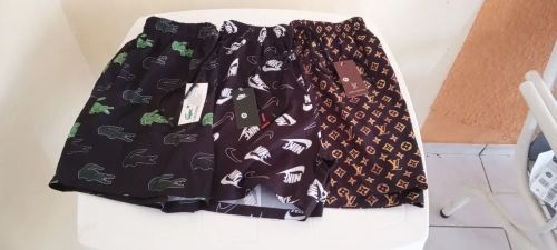 Shorts de Praia - Nike, Lacoste e Louis Vuitton