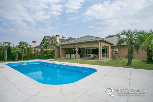 Venda de Casa em Condomínio em Porto Alegre-RS, bairro Terra Ville com 441m² Área Const.