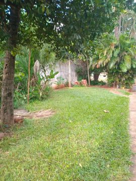 Quarto com varanda em área verde