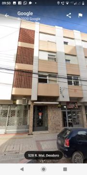 Apartamento central de um dormitório 