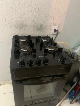 Fogão Consul 4 bocas preto com mesa de vidro