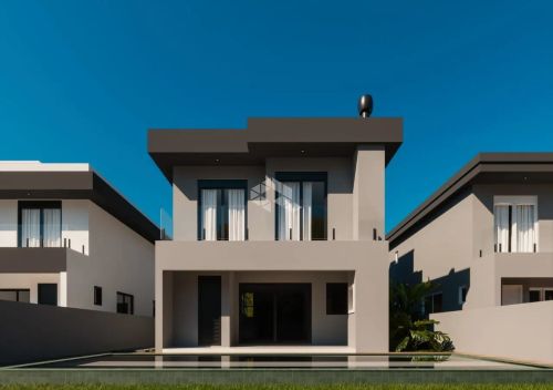 Casa com 03 suítes em Cacupé / SC fino acabamento, piscina e próximo ao comércio local.