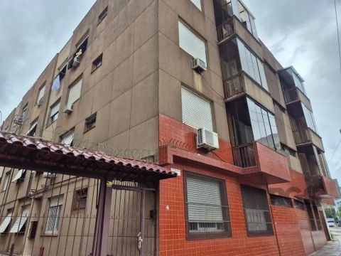 Imóvel reformado com dois dormitórios.Cozinha com área de serviço separada.Banheiro, sala 