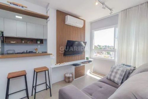 Apartamento mobiliado com 2 dormitórios e 1 vaga no bairro Jardim Lindóia!