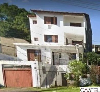 Casa 5 dormitórios, Bairro Cavalhada, 4 vagas na garagem.